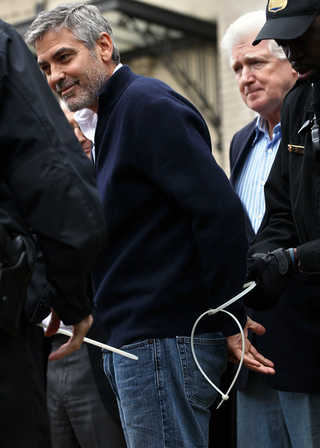 Illustration for article titled Grizzled Do-Gooder George Clooney Arrested in D.C.